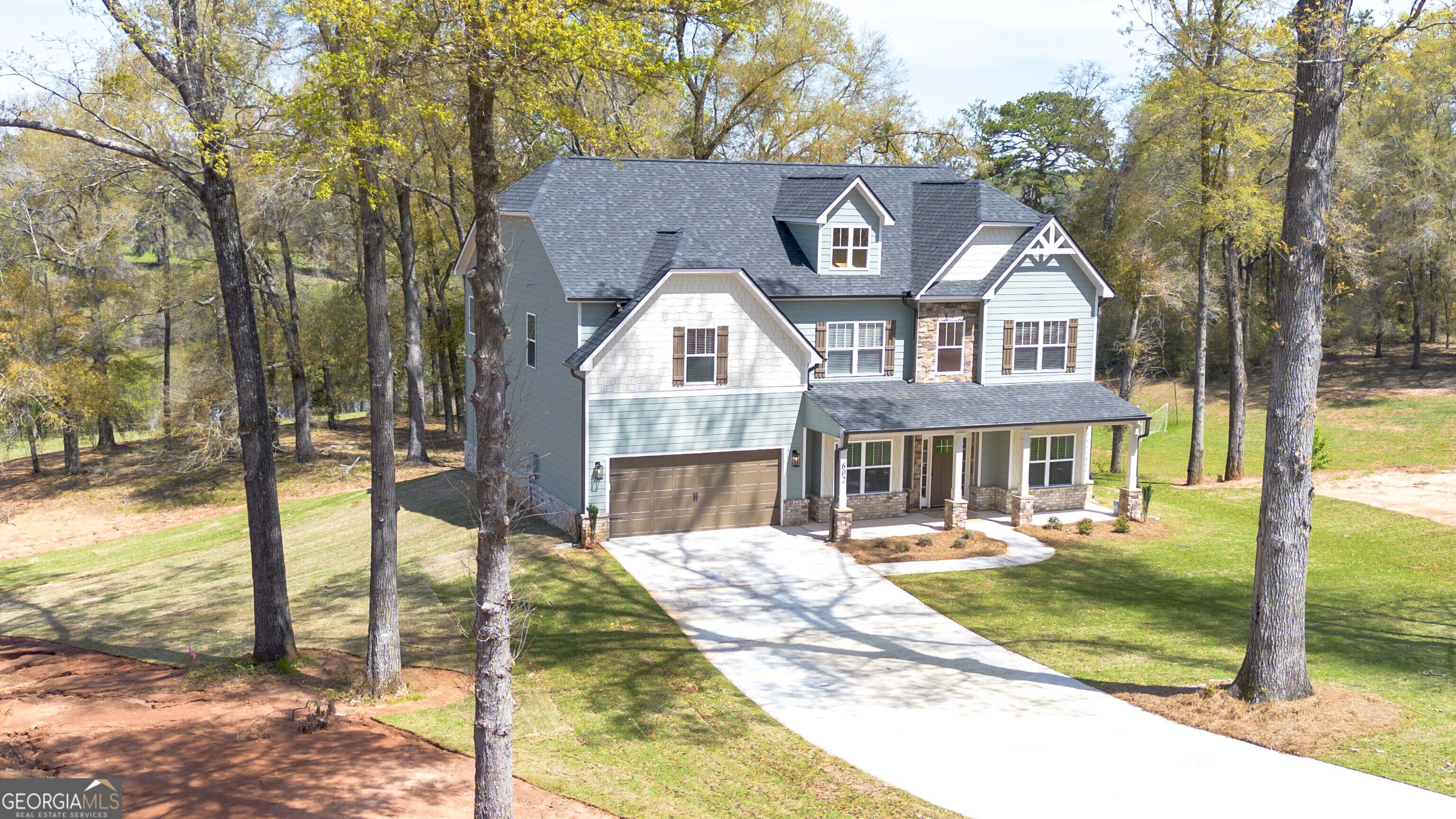 604 Beaver Court Perry, GA 31069 - Photo 38 of 40 a front view of a house with a yard