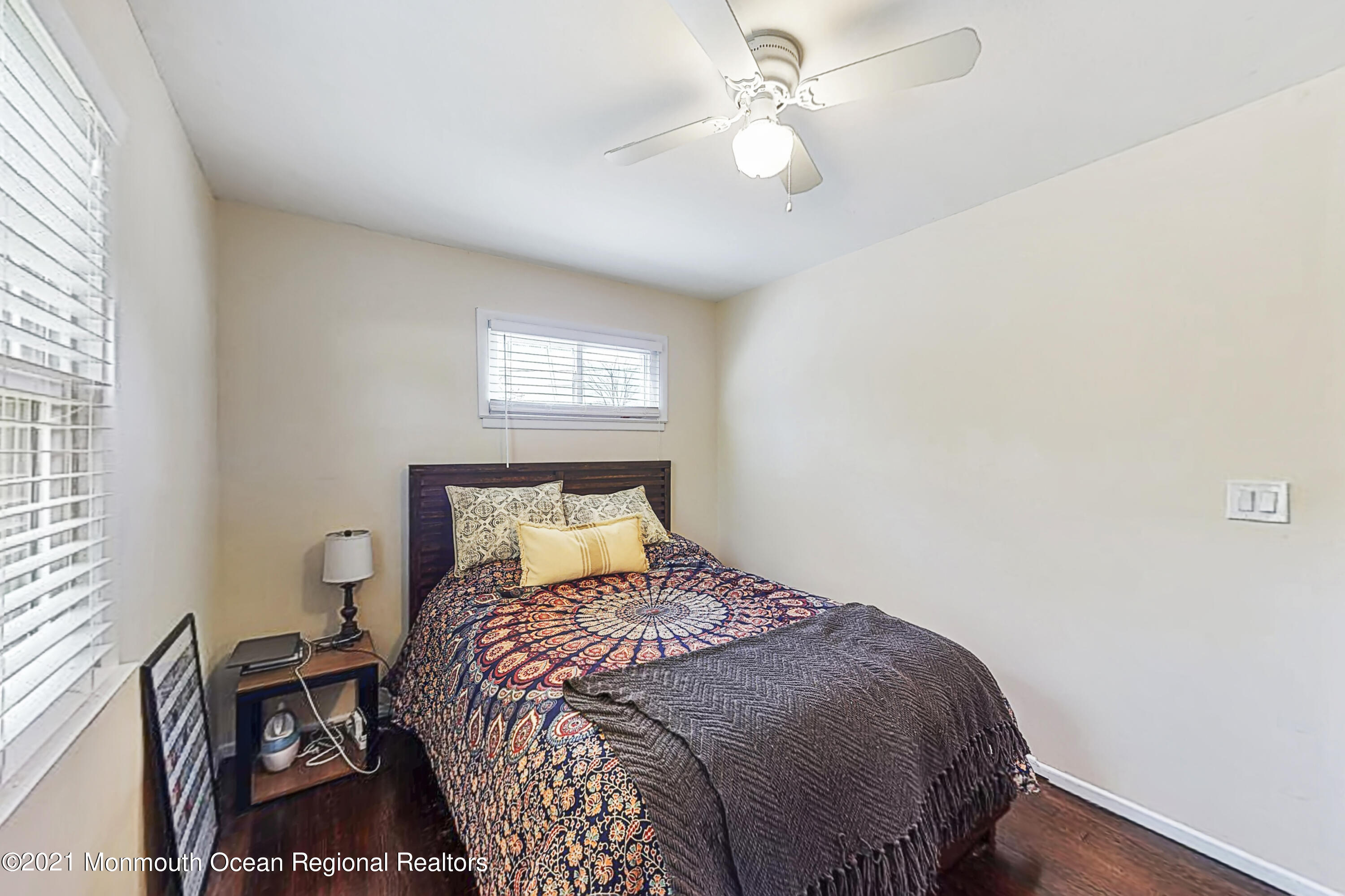 342 Stinson Road Brick, NJ 08723 - Photo 11 of 24 a bedroom with a bed and a window