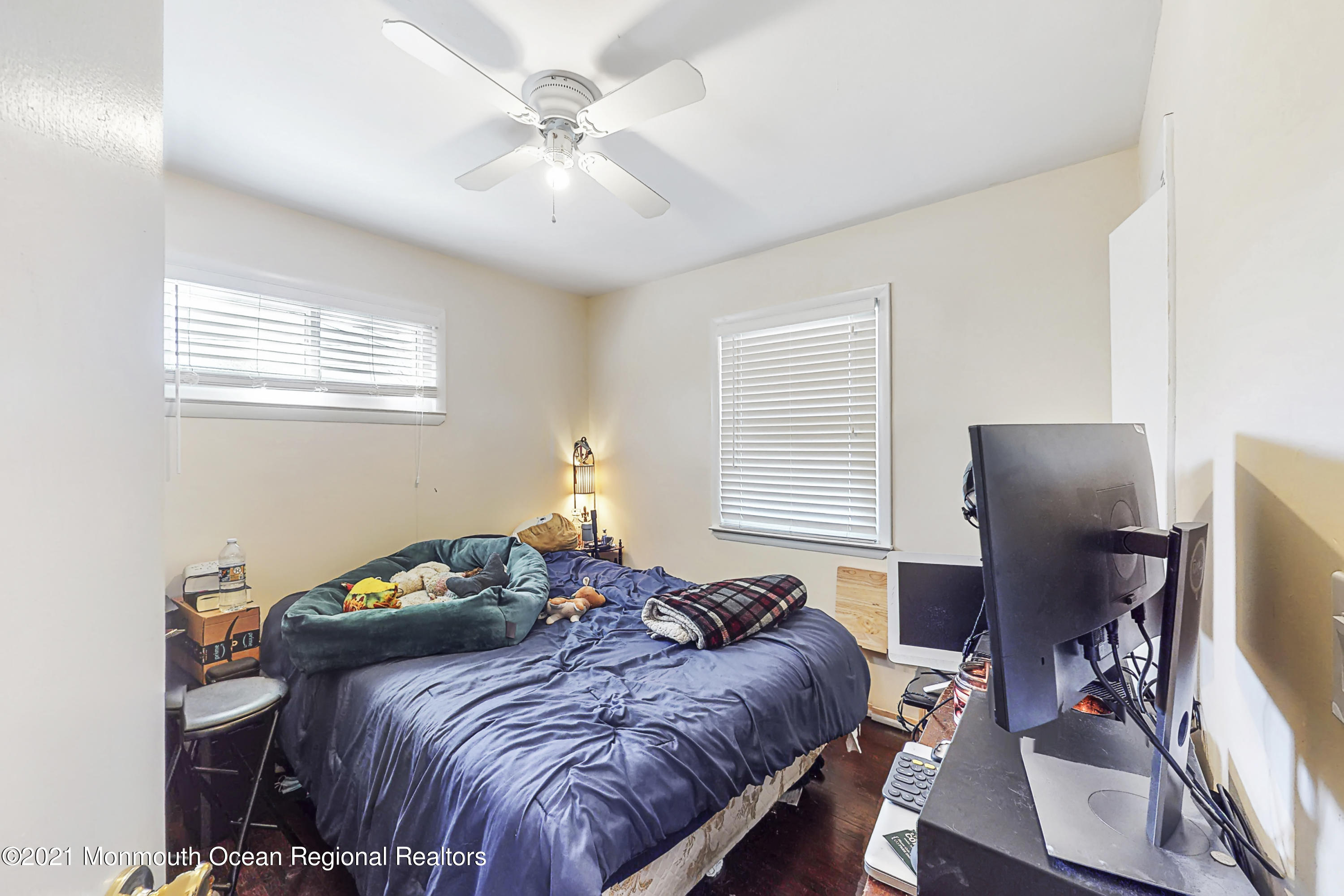 342 Stinson Road Brick, NJ 08723 - Photo 14 of 24 a bedroom with a bed and a flat screen tv