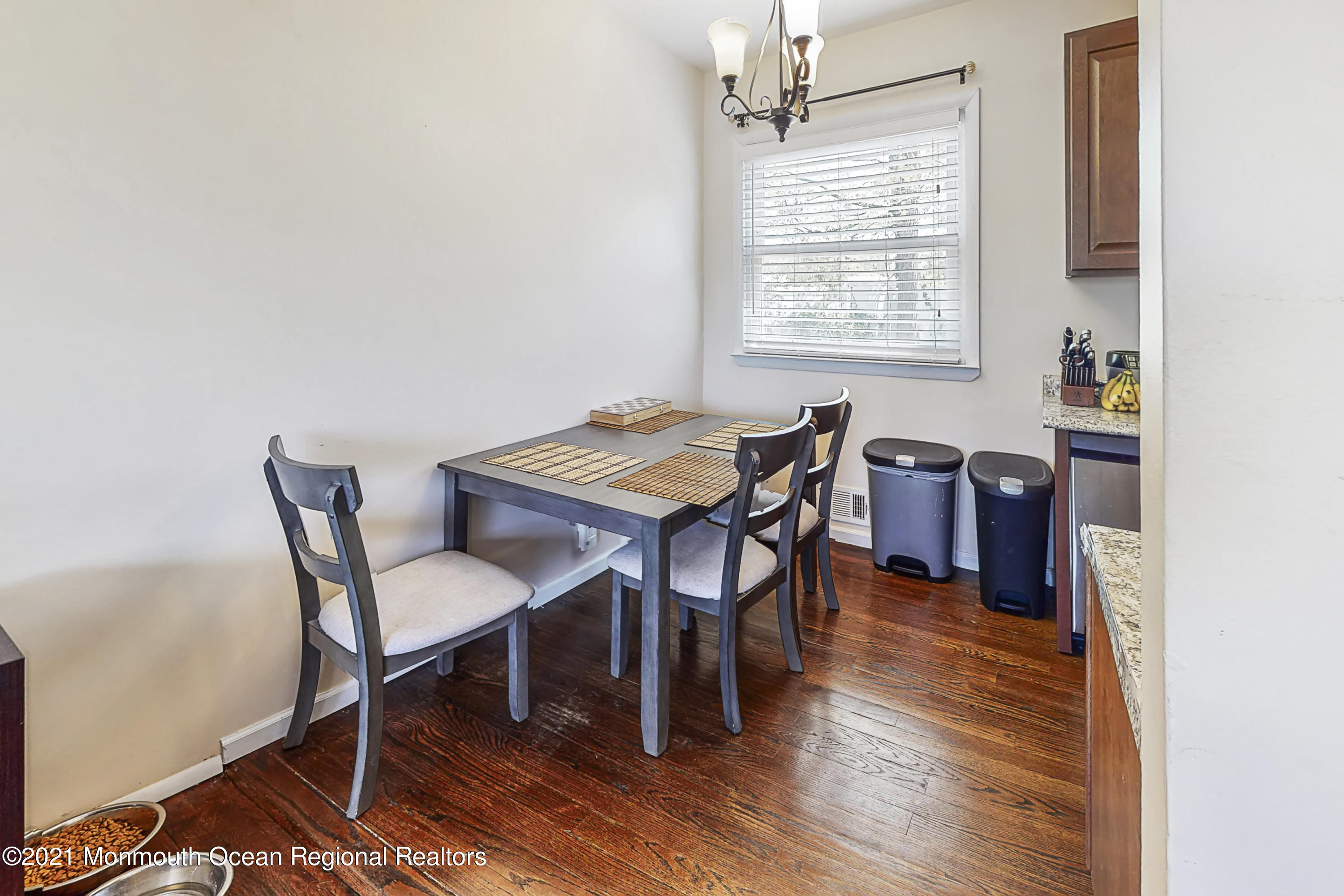 342 Stinson Road Brick, NJ 08723 - Photo 16 of 24 a view of a dining room with furniture and wooden floor