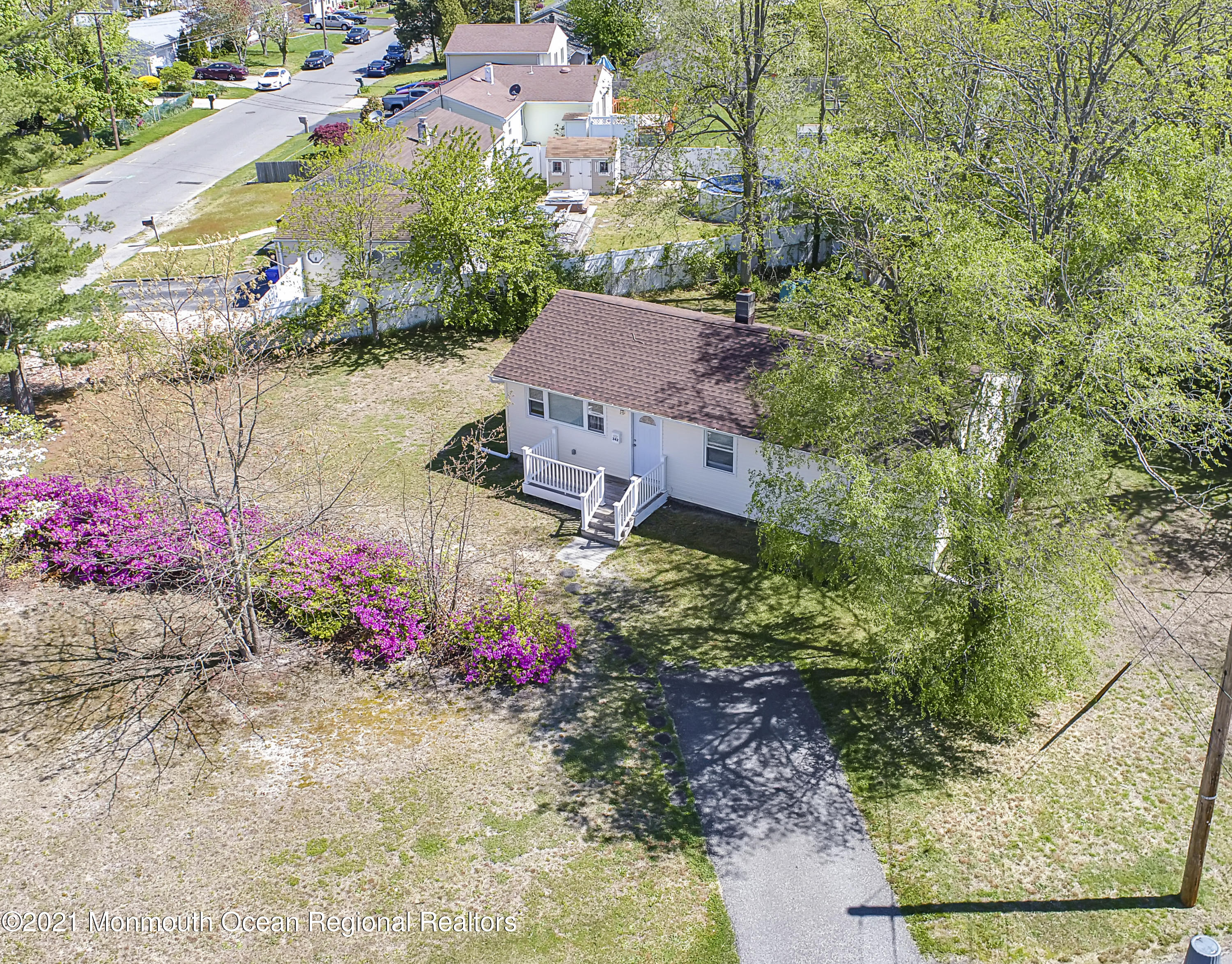 342 Stinson Road Brick, NJ 08723 - Photo 19 of 24 an aerial view of a house with a yard and garden