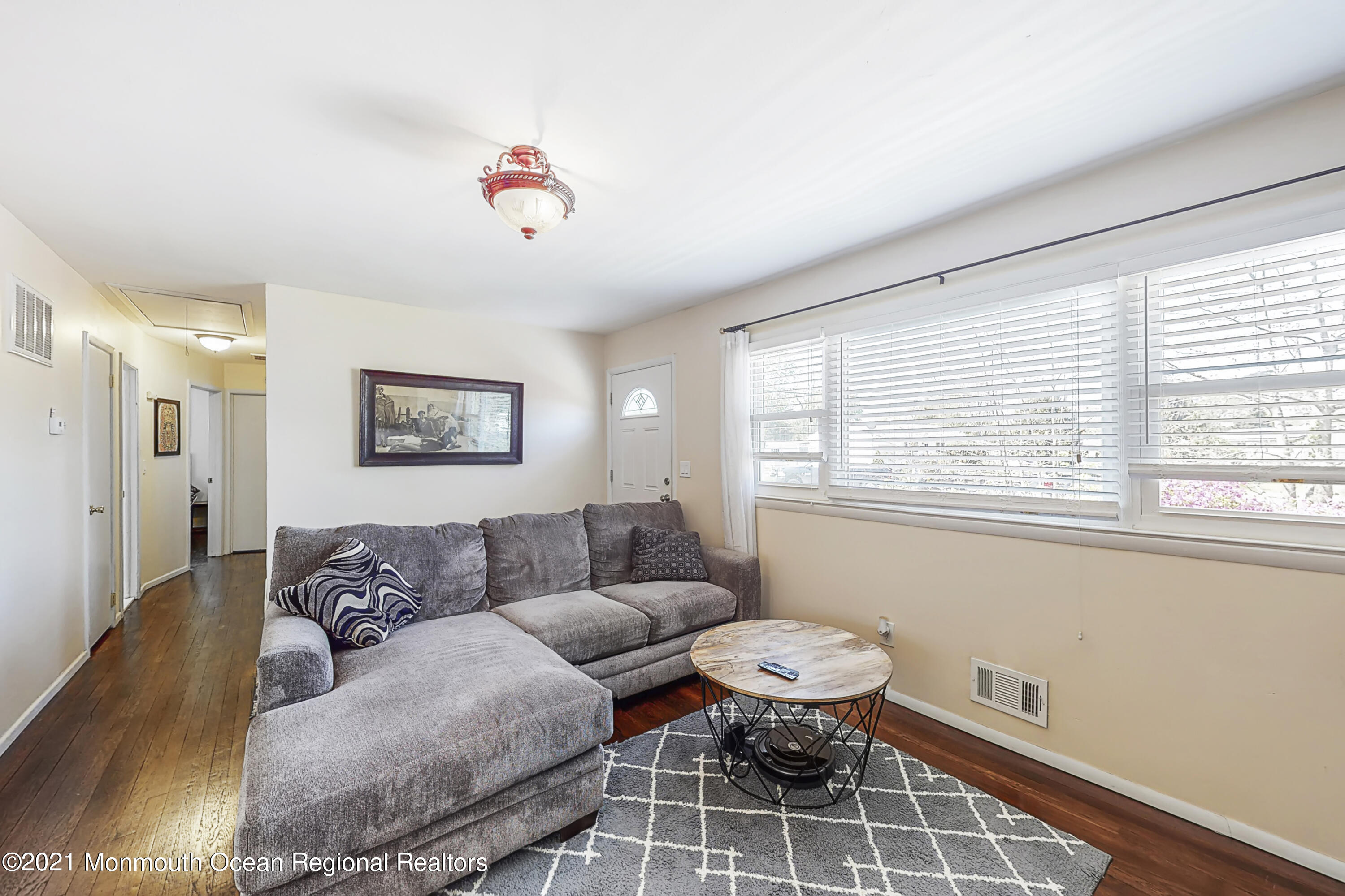 342 Stinson Road Brick, NJ 08723 - Photo 3 of 24 a living room with furniture and a window