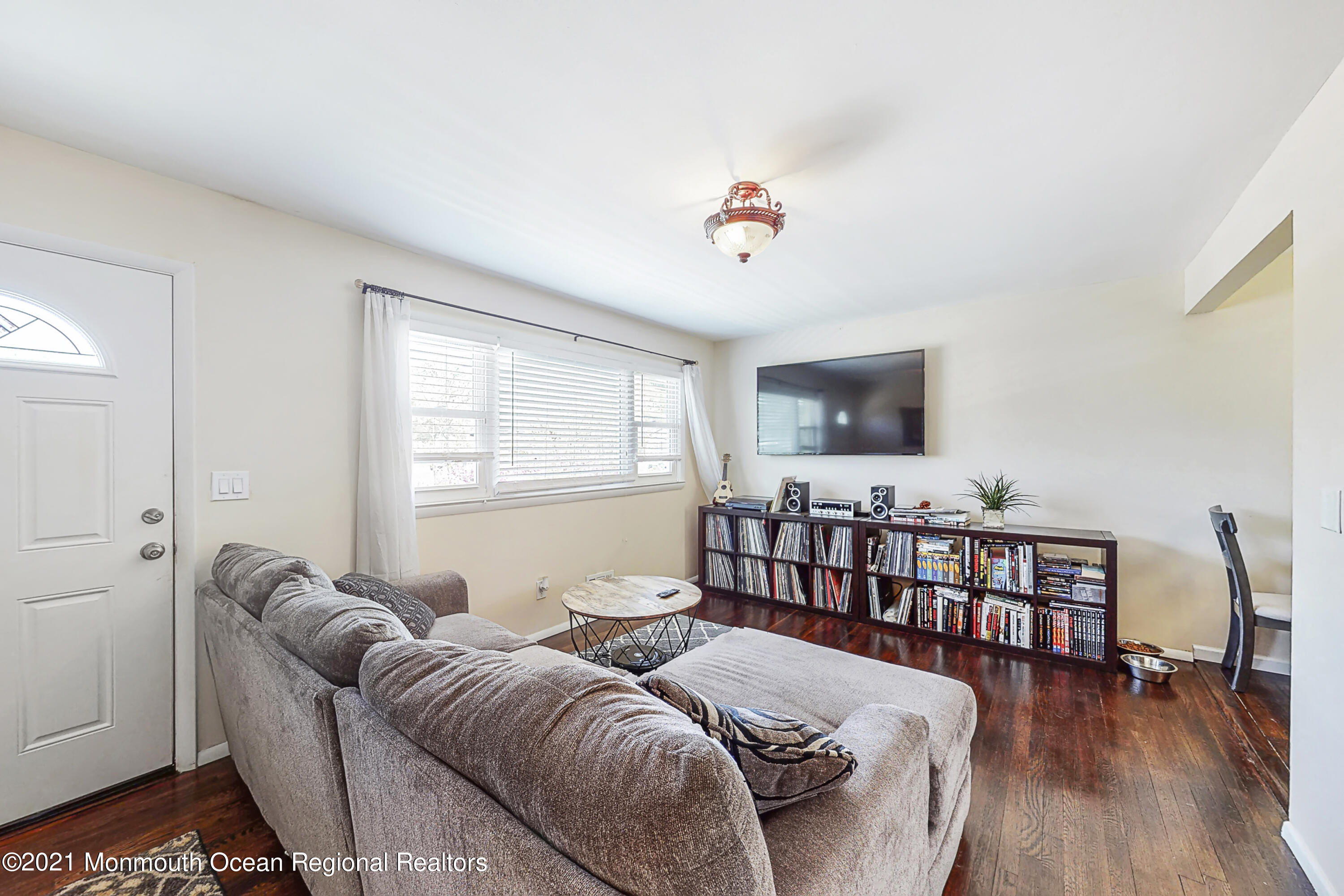 342 Stinson Road Brick, NJ 08723 - Photo 4 of 24 a living room with furniture and a wooden floor