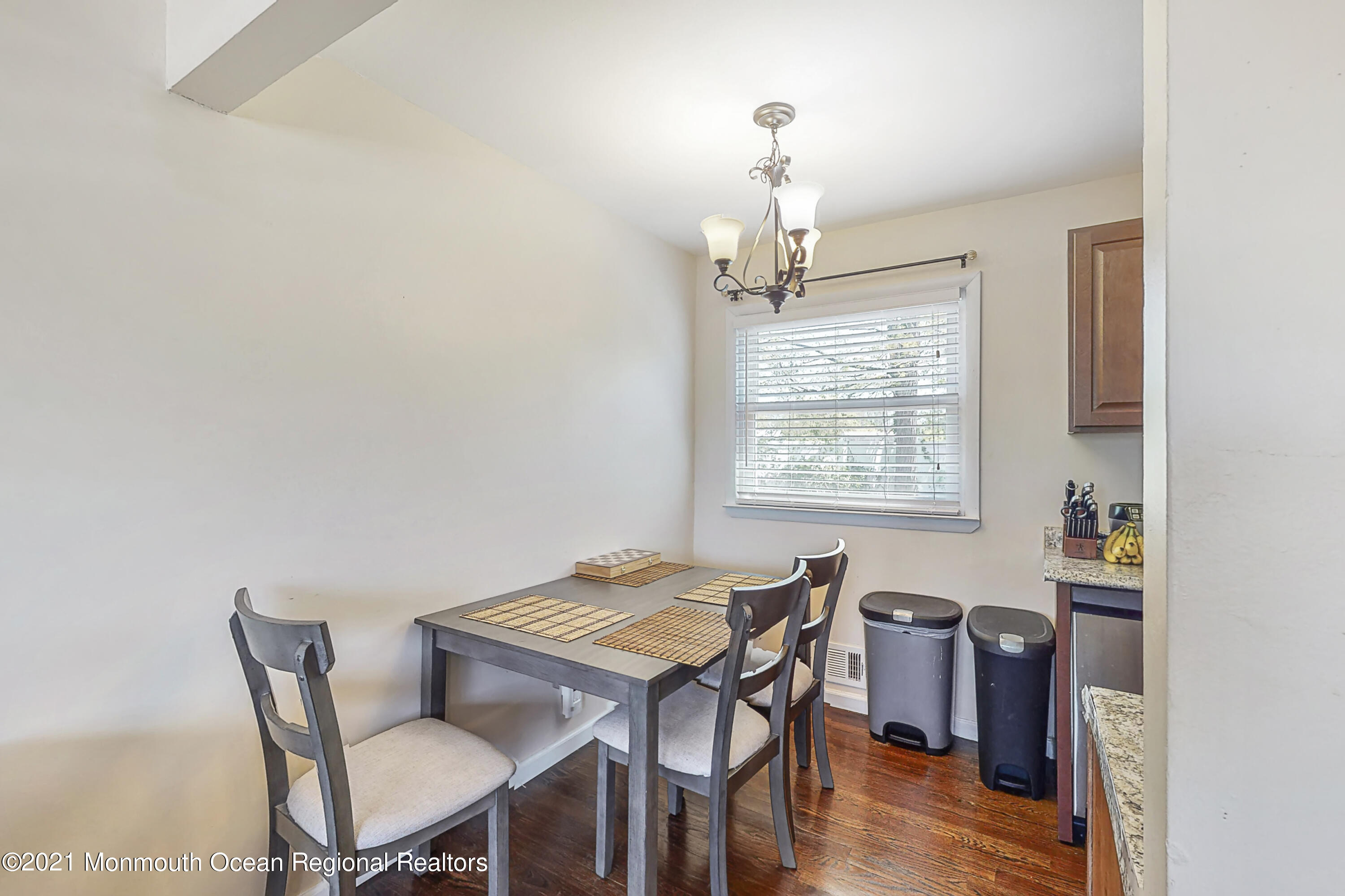 342 Stinson Road Brick, NJ 08723 - Photo 6 of 24 a view of a dining room with furniture window and wooden floor