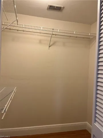 a view of small space with racks on the wall