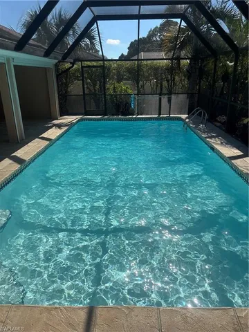 a view of a backyard of the house