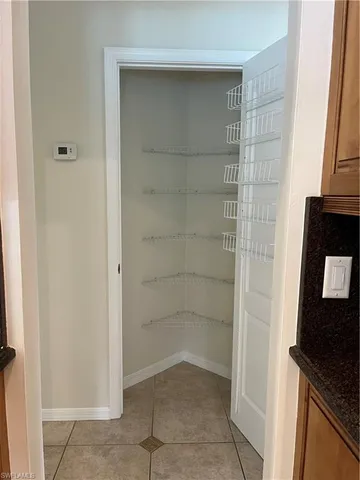 a view of storage and utility room