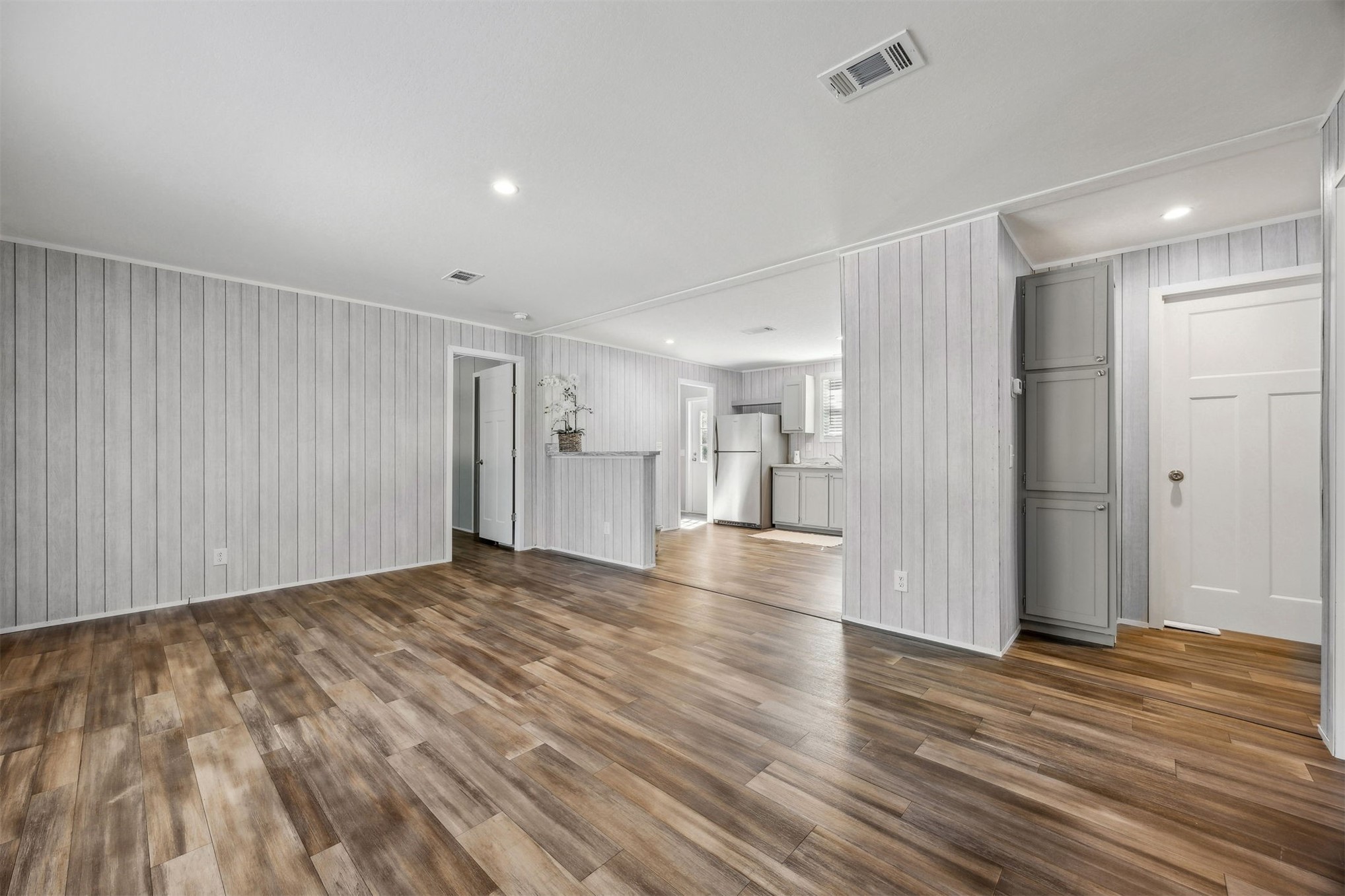 86491 Goodbread Road Yulee, FL 32097 - Photo 7 of 32 a view of empty room with wooden floor