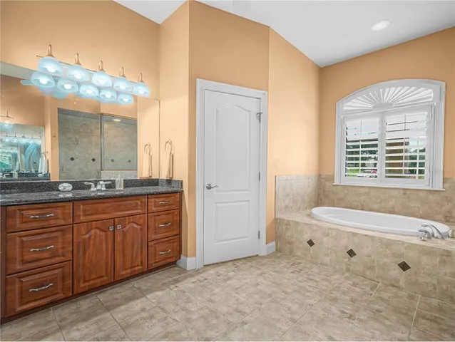 $950,000 | 565 Whisper Woods Drive, Lakeland, FL 33813