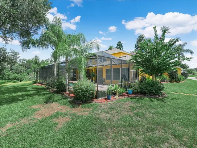 an aerial view of a house with a garden