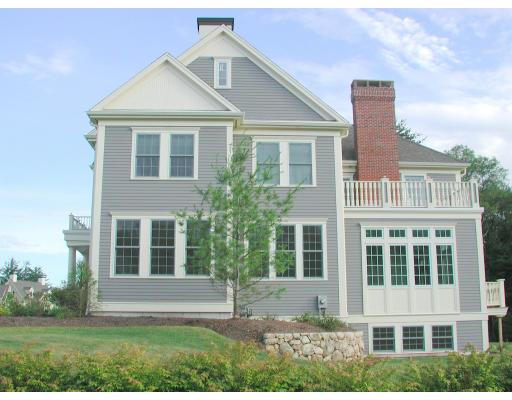 7 Old Barn Road Hanover, MA 02339 - Photo 13 of 14 a front view of a house with a yard
