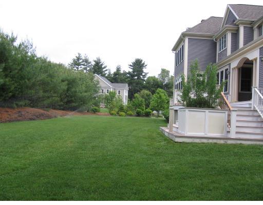 7 Old Barn Road Hanover, MA 02339 - Photo 10 of 14 a view of a house with a yard and sitting area
