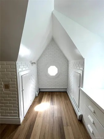 a view of an entryway with a kitchen