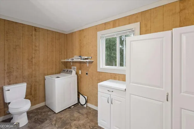 a view of bathroom with a sink and a toilet