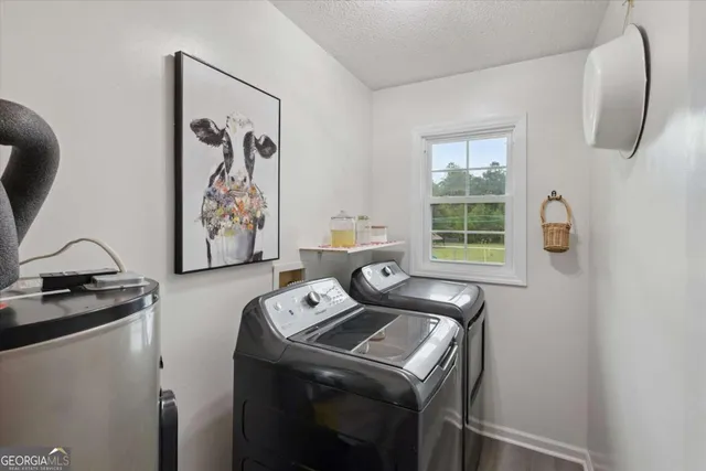 a view of a patio with couches table and chairs
