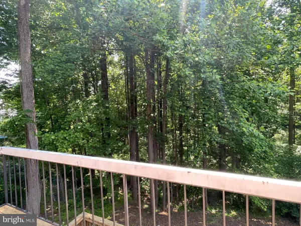 a view of a wooden fence