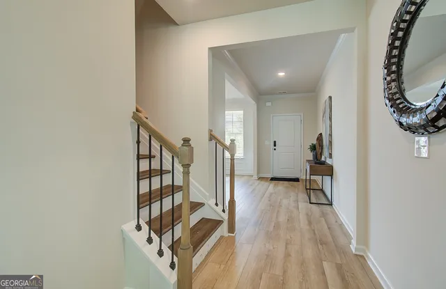 a view of entryway with wooden floor