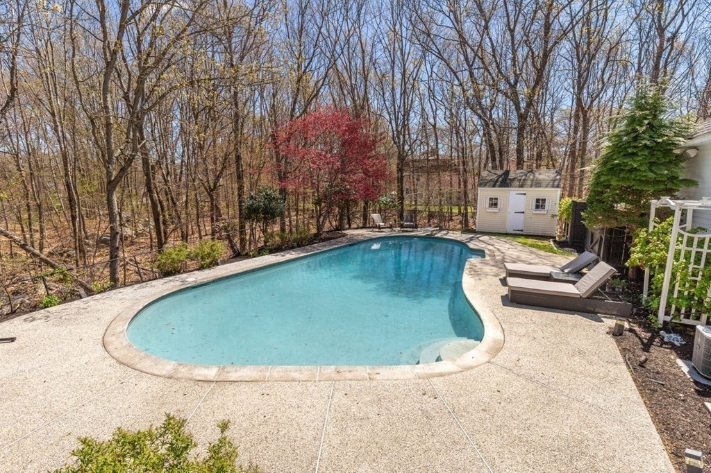 7 Kings Road Sharon, MA 02067 - Photo 40 of 41 a view of a swimming pool with a backyard