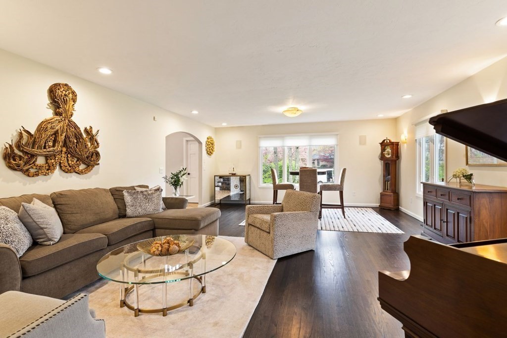 7 Kings Road Sharon, MA 02067 - Photo 8 of 41 a living room with furniture and a flat screen tv