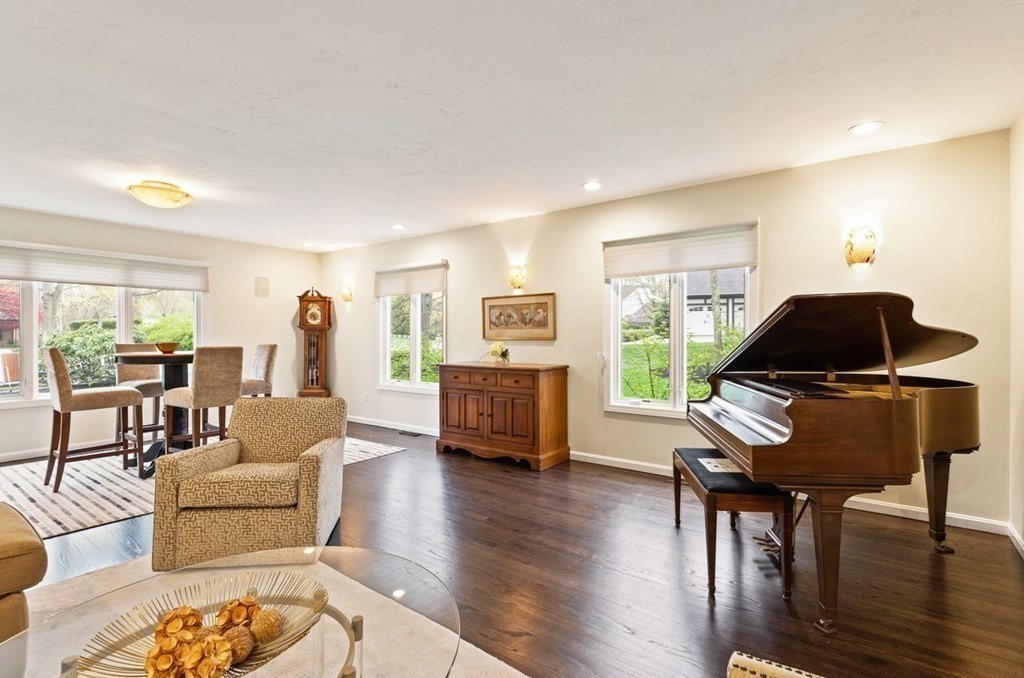 7 Kings Road Sharon, MA 02067 - Photo 9 of 41 a living room with furniture and a wooden floor