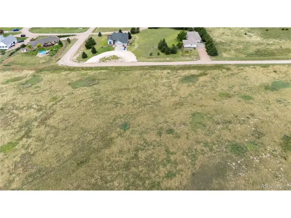 a black and white photo of a field