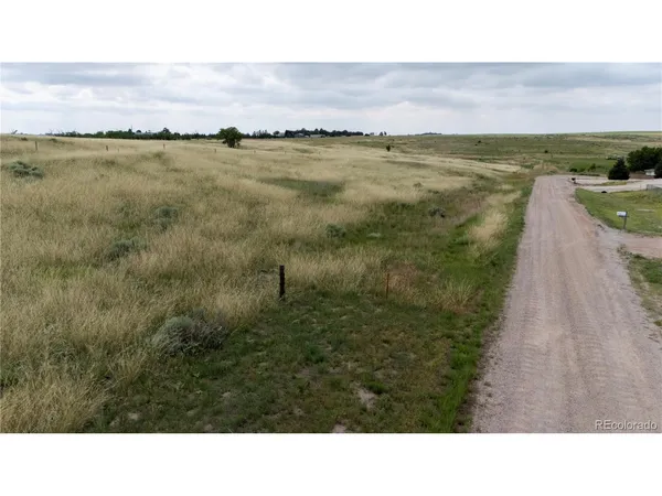 a open area with lake view and mountain view