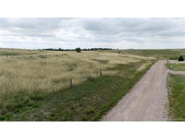 a view of a lake with a city