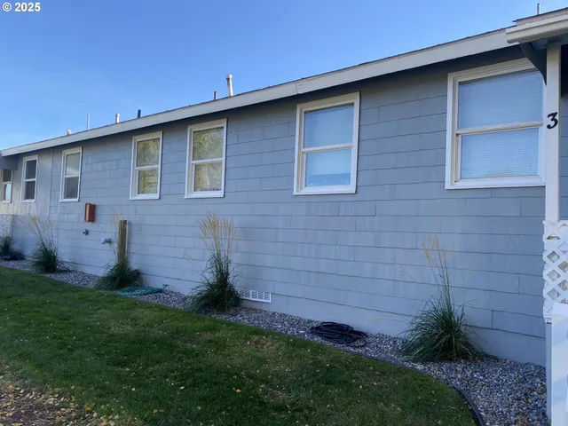 a bathroom with a sink a mirror and a toilet
