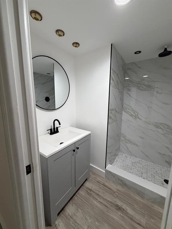 a bathroom with a sink and mirror