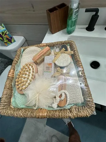 a kitchen with a refrigerator and a stove top oven