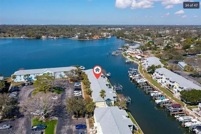a view of a lake with sitting area