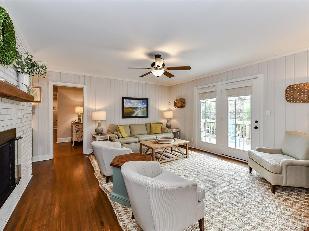 3110 Ferncliff Road Charlotte, NC 28211 - Photo 14 of 41 a living room with furniture and a fireplace