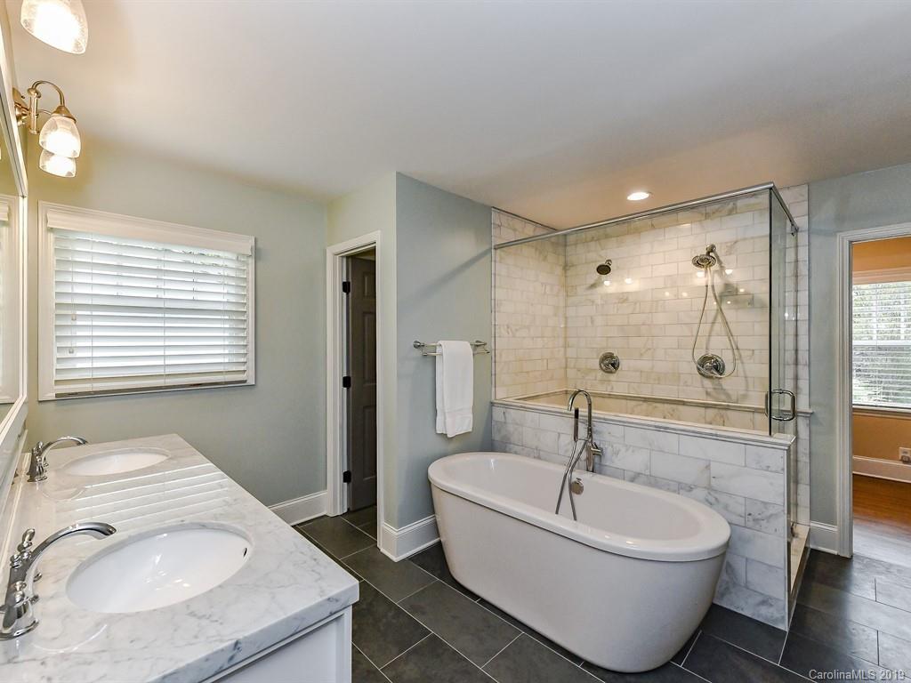 3110 Ferncliff Road Charlotte, NC 28211 - Photo 21 of 41 a bathroom with a sink and mirror