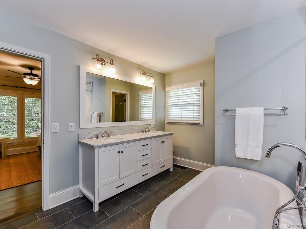 3110 Ferncliff Road Charlotte, NC 28211 - Photo 22 of 41 a bedroom with a bed and a dresser