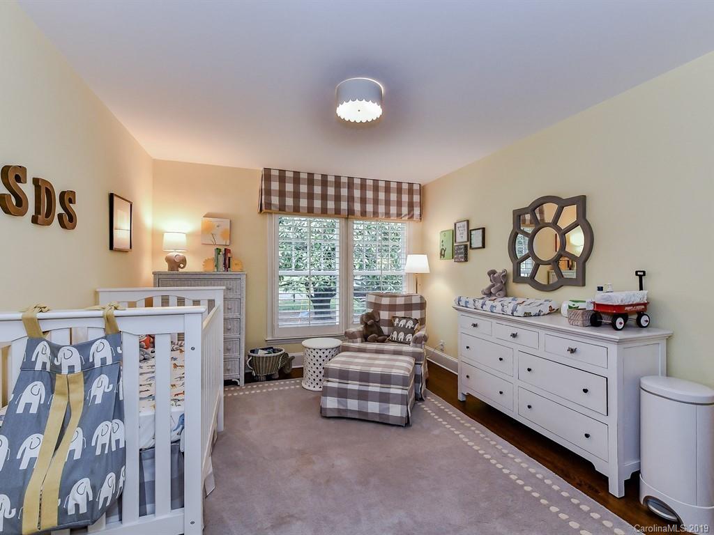 3110 Ferncliff Road Charlotte, NC 28211 - Photo 23 of 41 a bedroom with furniture and a window
