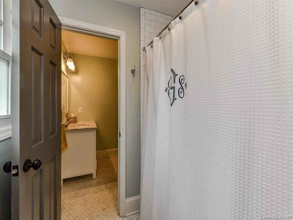 3110 Ferncliff Road Charlotte, NC 28211 - Photo 25 of 41 a bathroom with a shower and a sink