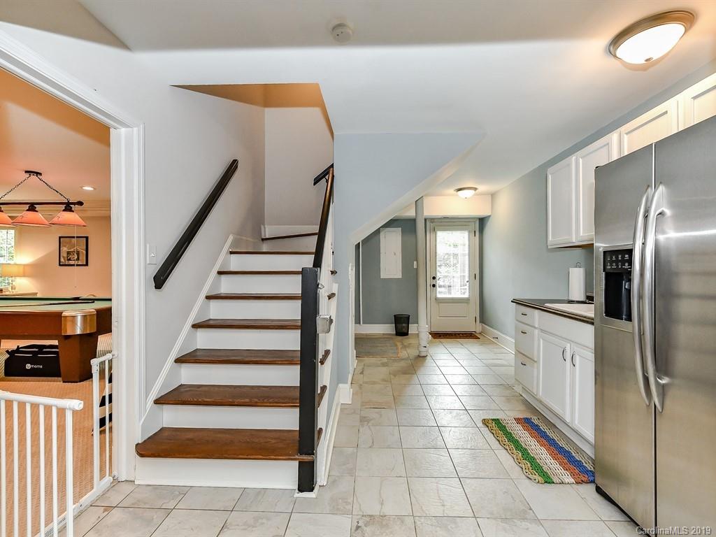 3110 Ferncliff Road Charlotte, NC 28211 - Photo 27 of 41 a view of a kitchen with an entryway and an empty room