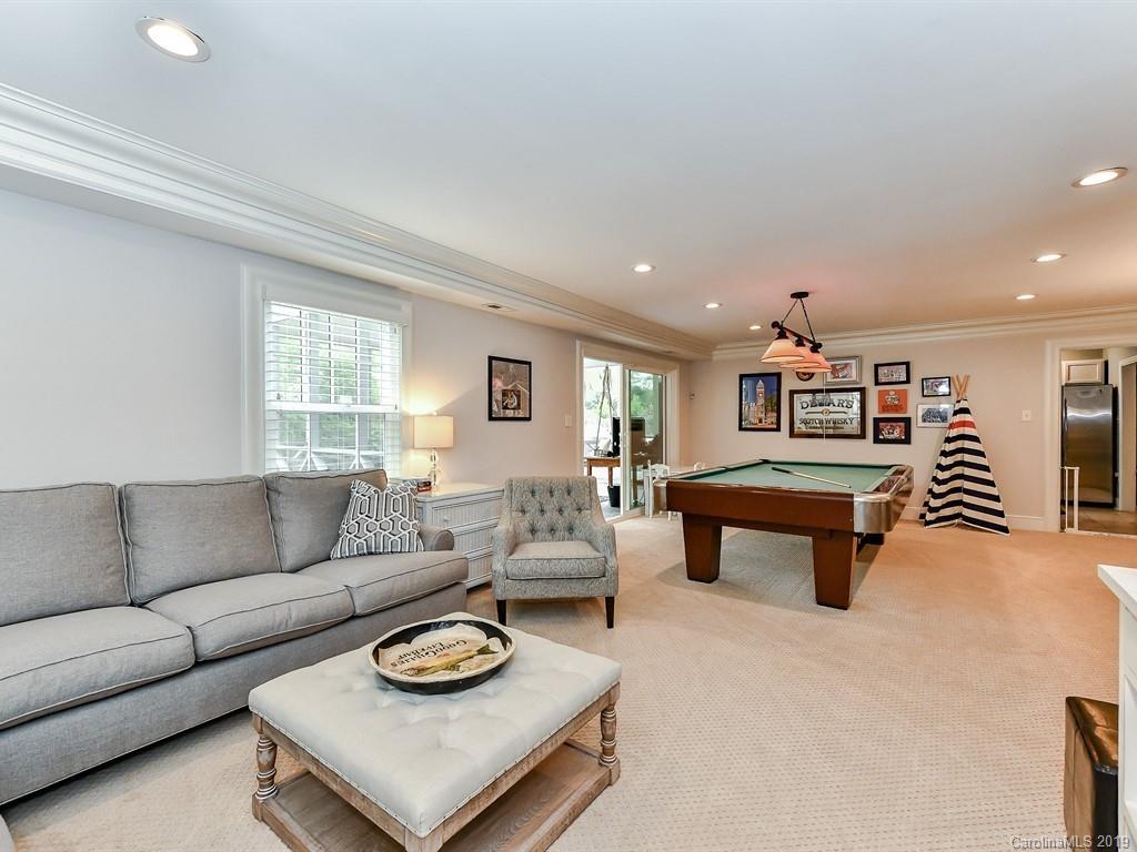 3110 Ferncliff Road Charlotte, NC 28211 - Photo 30 of 41 a living room with furniture and a wooden floor
