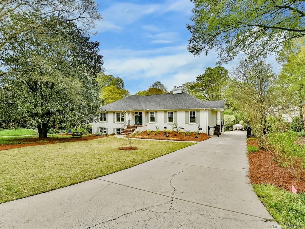 3110 Ferncliff Road Charlotte, NC 28211 - Photo 41 of 41 a front view of a house with swimming pool and porch with furniture