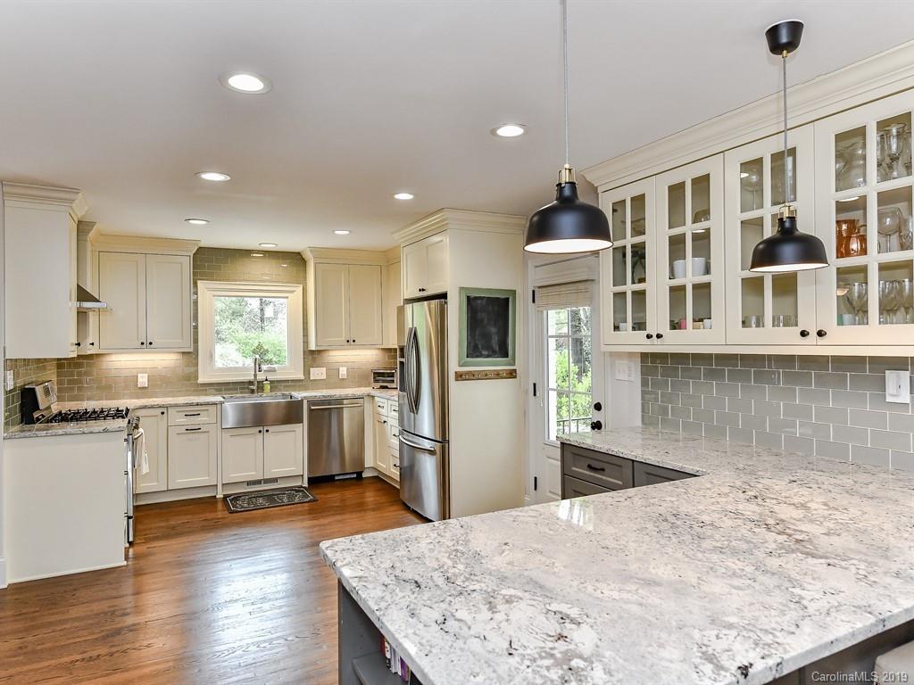 3110 Ferncliff Road Charlotte, NC 28211 - Photo 9 of 41 a kitchen with stove and refrigerator