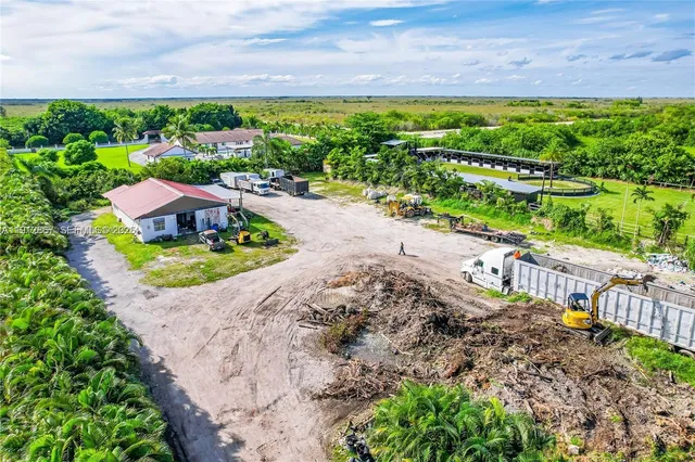 a view of a garden with an ocean view