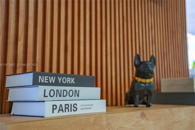 a sign on a brick wall