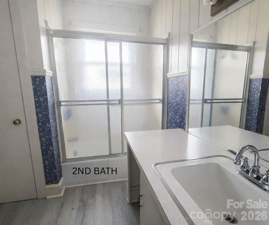 7362 Hull Road Cherryville, NC 28021 - Photo 13 of 22 a view of a refrigerator a window a wooden floor