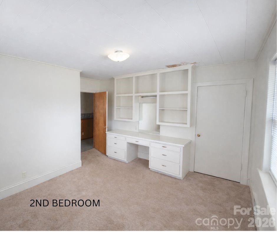 7362 Hull Road Cherryville, NC 28021 - Photo 15 of 22 a room with cabinets and window
