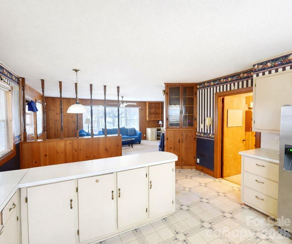 7362 Hull Road Cherryville, NC 28021 - Photo 5 of 22 a kitchen with cabinets and wooden floor