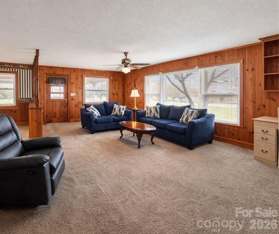 7362 Hull Road Cherryville, NC 28021 - Photo 7 of 22 a living room with furniture and a large window