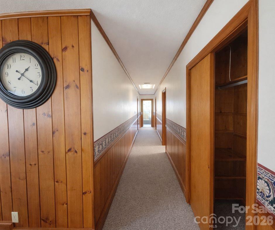 7362 Hull Road Cherryville, NC 28021 - Photo 9 of 22 a view of a hallway with washer and dryer