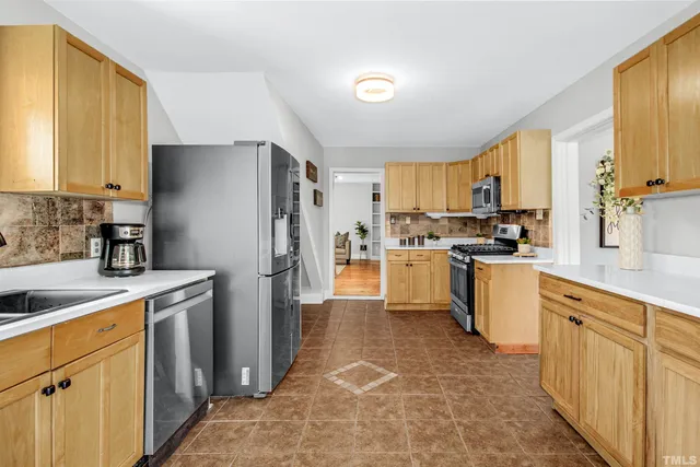 a view of a park with large trees