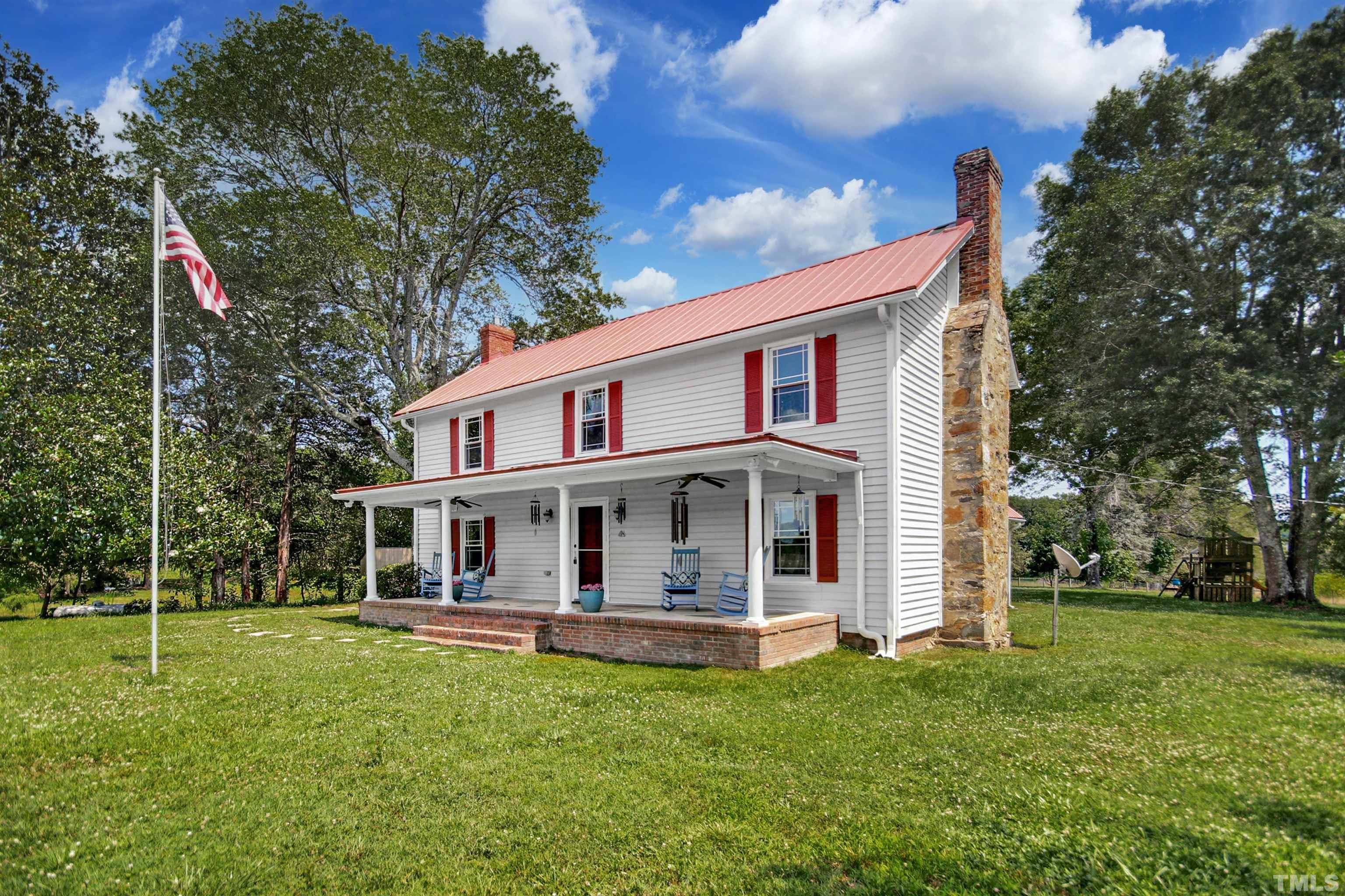 4610 Hall Road Rougemont, NC 27572 - Photo 37 of 43 a view of a house with a yard balcony and tall tree