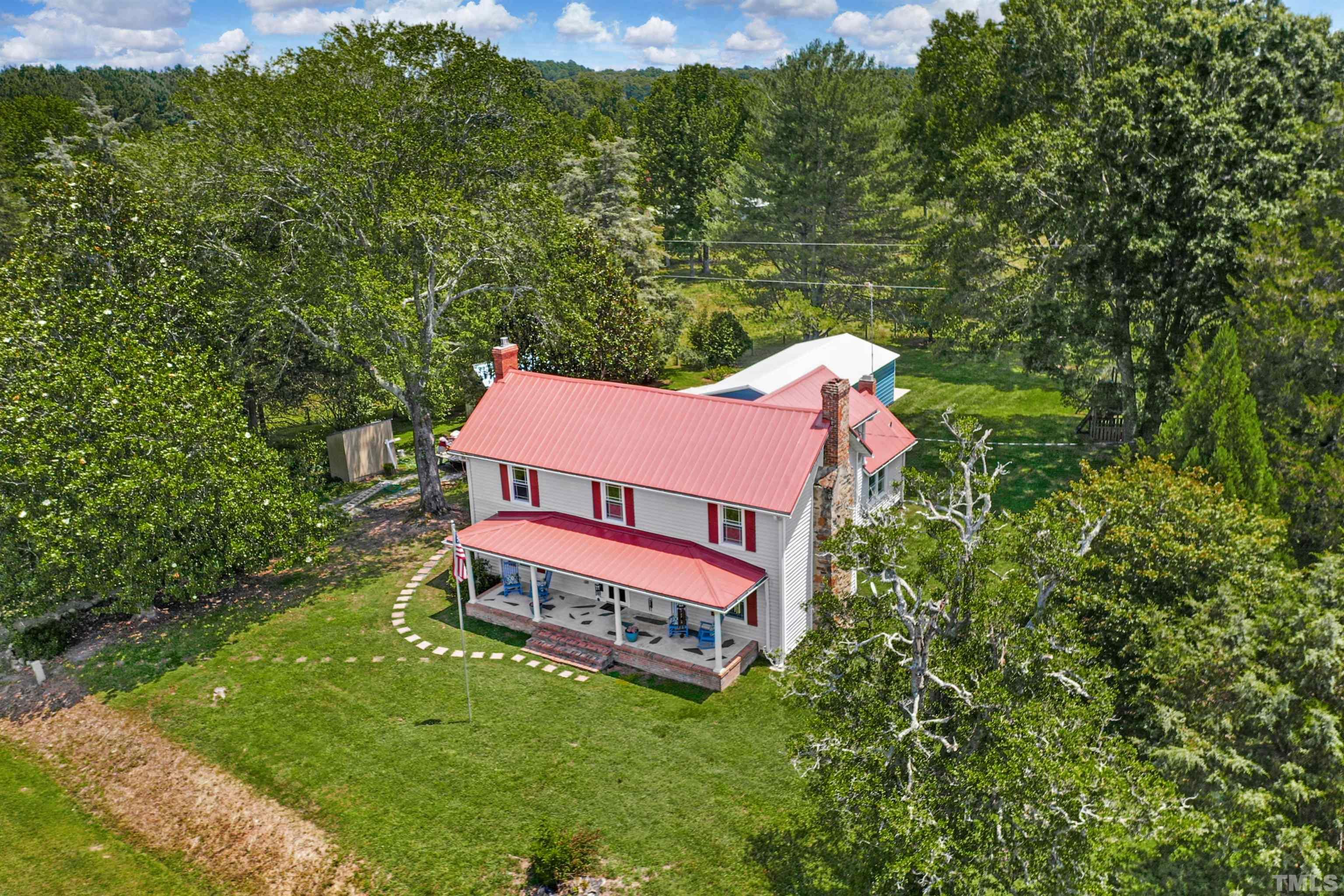 4610 Hall Road Rougemont, NC 27572 - Photo 39 of 43 a swimming pool with trees in the background